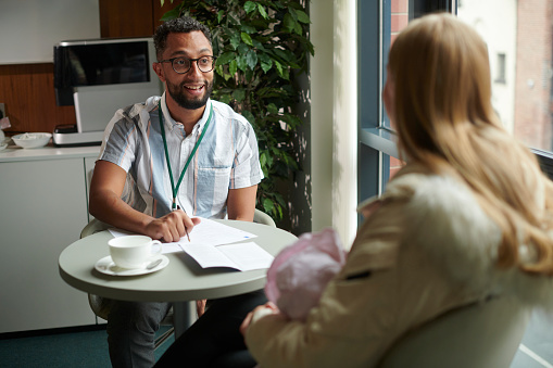 Adult, Female, Person, Woman, Male, Man, Conversation, Table, Coffee Cup, Head