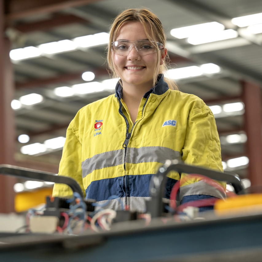 Clothing, Coat, Adult, Female, Person, Woman, Jacket, Worker, Face, Glasses