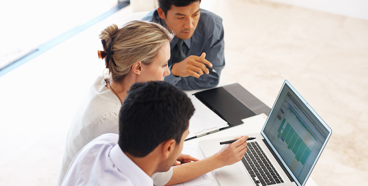 Executives discussing something in office