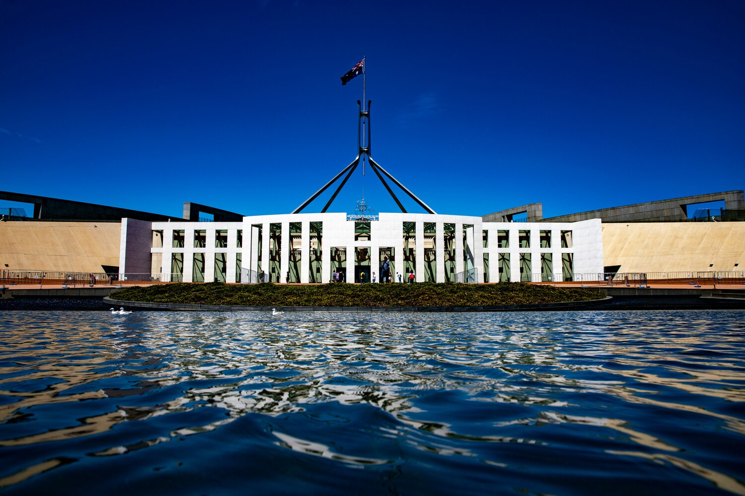 Water, Waterfront, Office Building, Parliament, Flag, Person, City, Urban, Bird, Outdoors