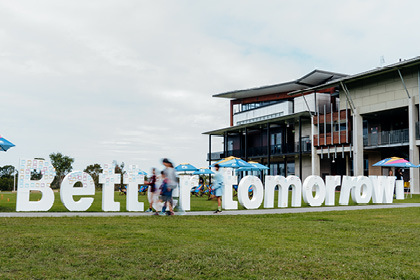 Grass, Lawn, Person, Hotel, Outdoors, Play Area, Outdoor Play Area, Resort, Park, Text