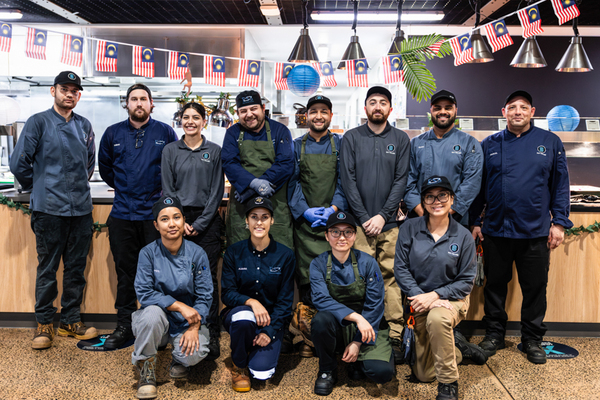Photo of Operations employees stood in a group