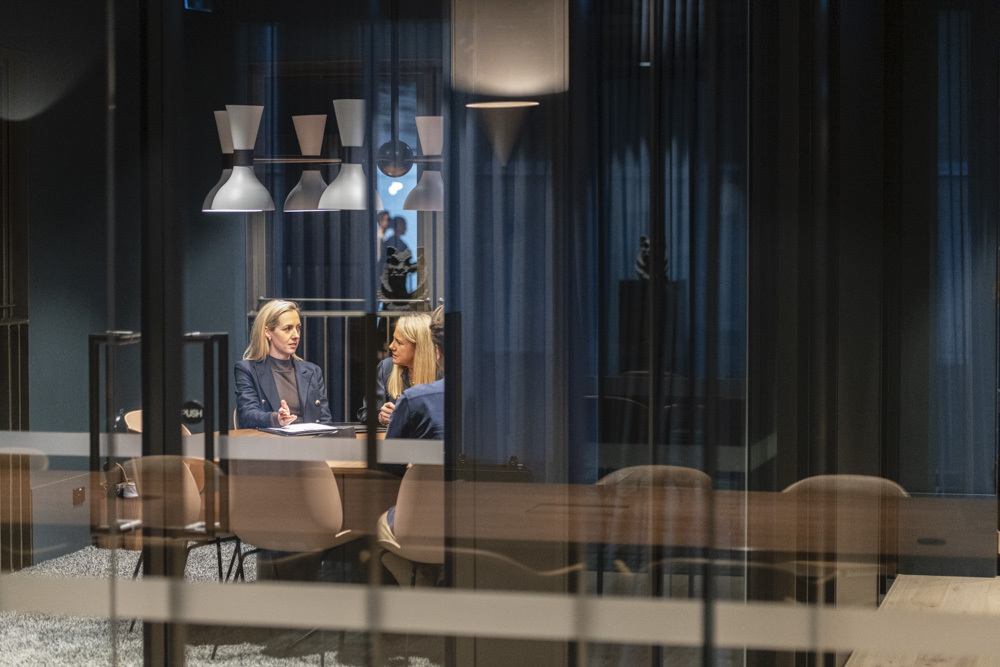 Adult, Female, Person, Woman, Building, Suit, Conversation, Face, Indoors, Interview
