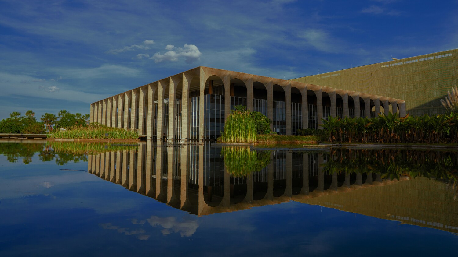 Architecture, Building, Office Building, Outdoors, Water, Nature, Pond, Waterfront, Person