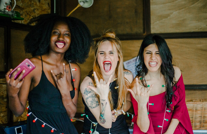 Adult, Female, Person, Woman, Tattoo, Head, Face, Mobile Phone, Happy, Laughing