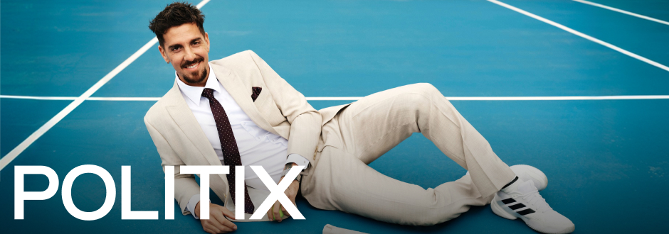 Formal Wear, Tie, Person, Sitting, Shoe, Adult, Male, Man, Suit, Sneaker